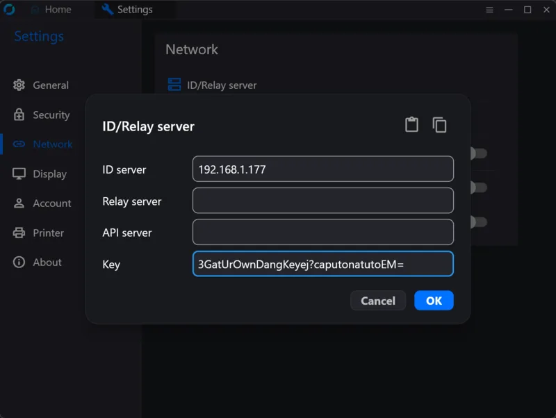 RustDesk client network settings showing ID Server and Key fields configured for a self-hosted server